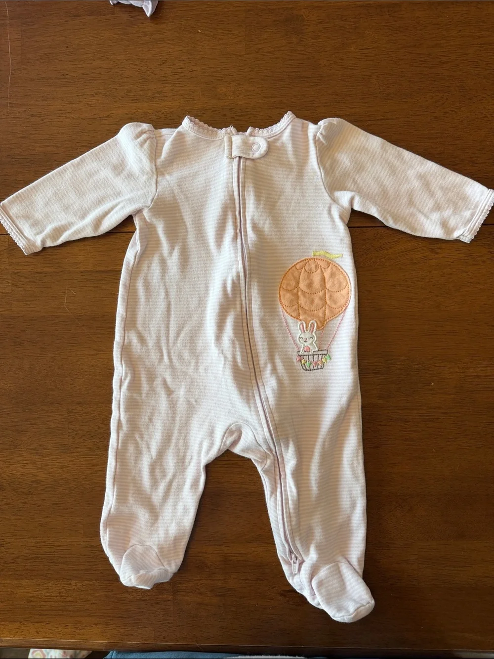 Carter's Baby Girl Mixed One-Piece Sets - Purple, Yellow, and Pink.
